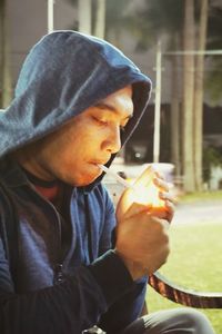 Portrait of man holding ice cream