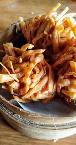 Close-up of fries in plate on table