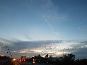 Scenic view of vapor trails against sky