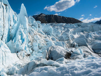 Crumbling glacial seracs and crevasses at the terminus of the matanuska glacier, alaska