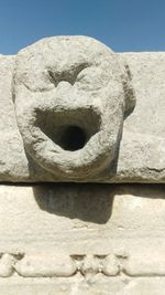 Low angle view of sculpture against sky