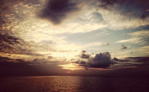 Scenic view of sea at sunset