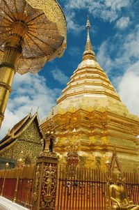 Low angle view of pagoda against building