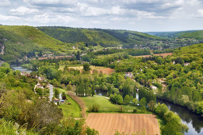 High angle view of trees on landscape against sky