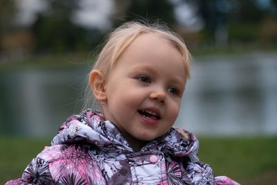 Portrait of cute girl smiling