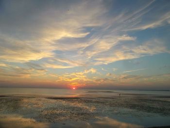 Scenic view of sea at sunset