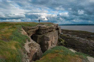 View of coastal feature against clouds