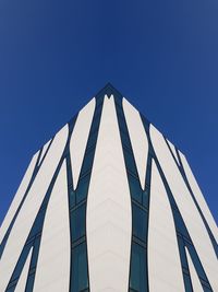 Low angle view of building against blue sky