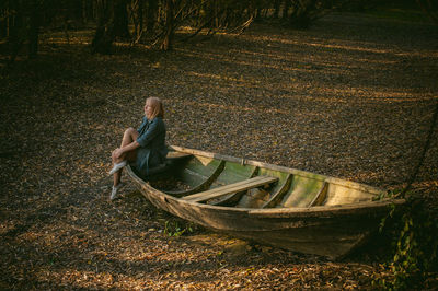 Man in boat on field