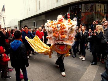 People in traditional clothing during festival