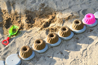 High angle view of toy on sand at beach