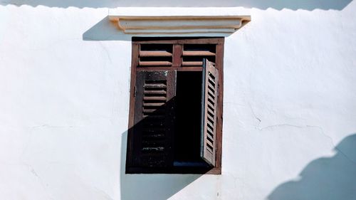 Close-up of window on white wall