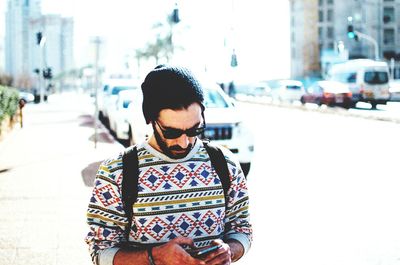 Woman standing in city