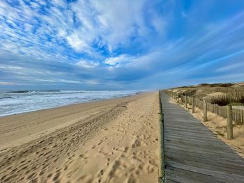 Scenic view of beach against sky