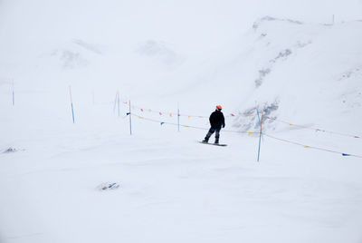 People skiing in snow