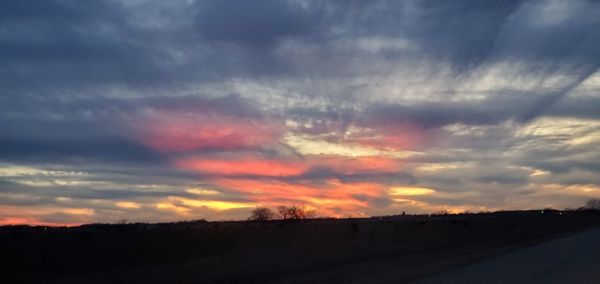 Scenic view of dramatic sky during sunset