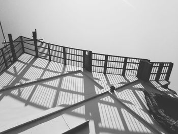 Low angle view of staircase against clear sky