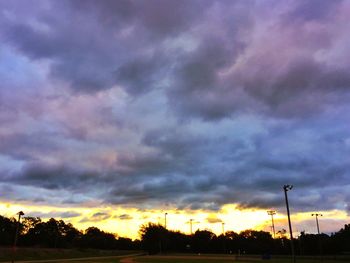 Low angle view of dramatic sky during sunset