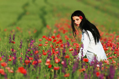 Woman standing on field