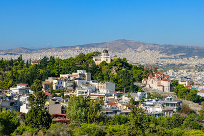 High angle shot of townscape against clear blue sky