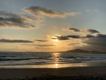 Scenic view of sea against sky during sunset on isabela island galapagos 