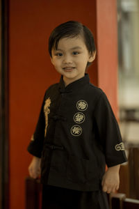 Portrait of boy standing