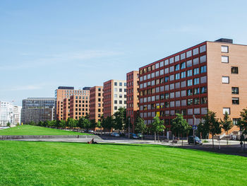 Buildings in city against sky