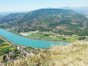 High angle view of river amidst landscape against sky