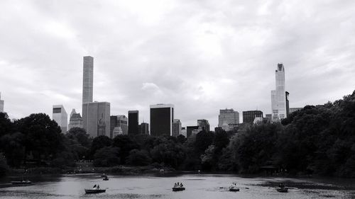 Buildings in distance with river in foreground