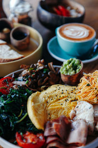 Morning breakfast, waffles with cream, berries, coffee, bowl, omlet with vegetables, avocado cream