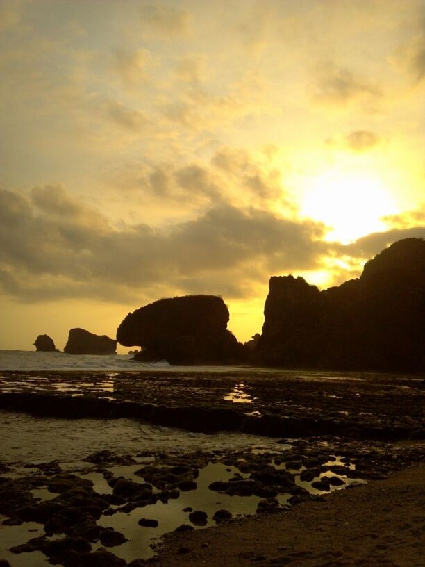 sunset, sea, water, scenics, tranquil scene, beauty in nature, beach, sky, tranquility, silhouette, shore, rock - object, idyllic, nature, orange color, mountain, sun, cloud - sky, horizon over water, rock formation