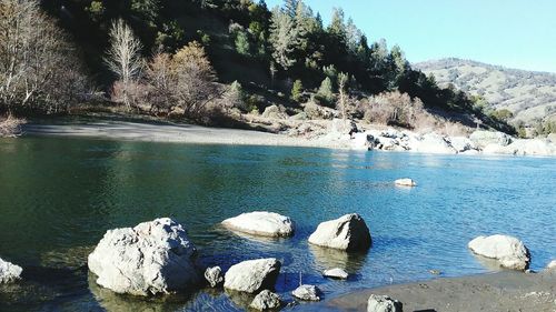 Scenic view of lake against clear sky