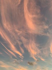 Low angle view of dramatic sky during sunset