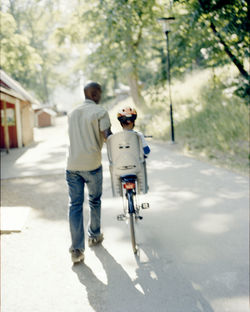 Father with son cycling