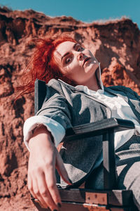 Portrait of a young woman looking away