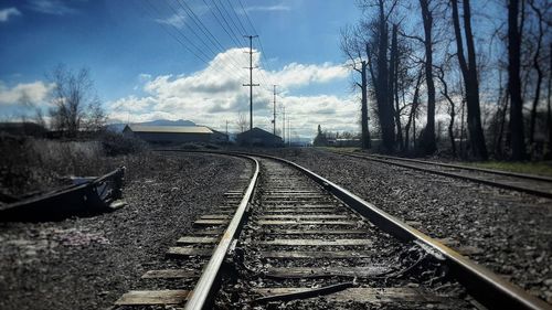 Railroad tracks against sky