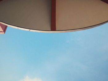 Low angle view of building against blue sky