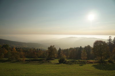 Scenic view of landscape against sky during sunset