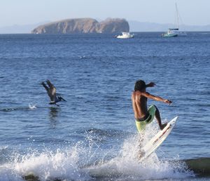 Woman swimming in sea