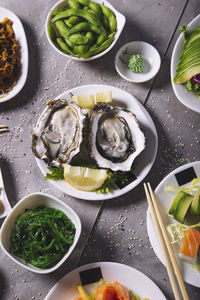 Fresh oysters with lemon. healthy food, gourmet food, restaurant food. top view.
