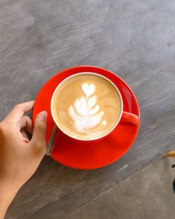 High angle view of coffee cup on table