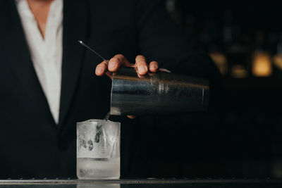 Close-up of hands working on table