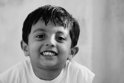 Close-up portrait of smiling boy