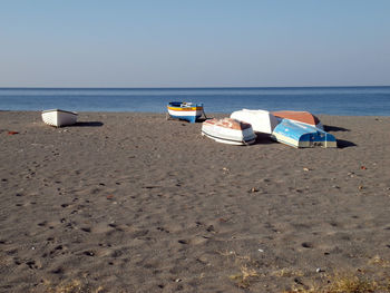 Lifeguard hut on beach against clear sky