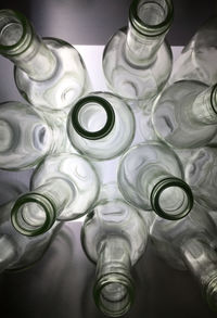 High angle view of glass bottles on table