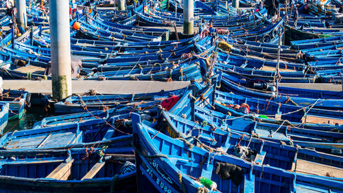 High angle view of fishing boats moored at harbor