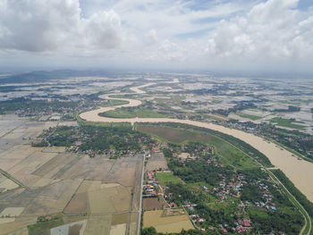 High angle view of agricultural field against sky