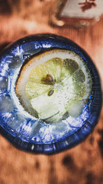 High angle view of drink in glass on table