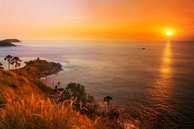 Scenic view of sea against sky during sunset