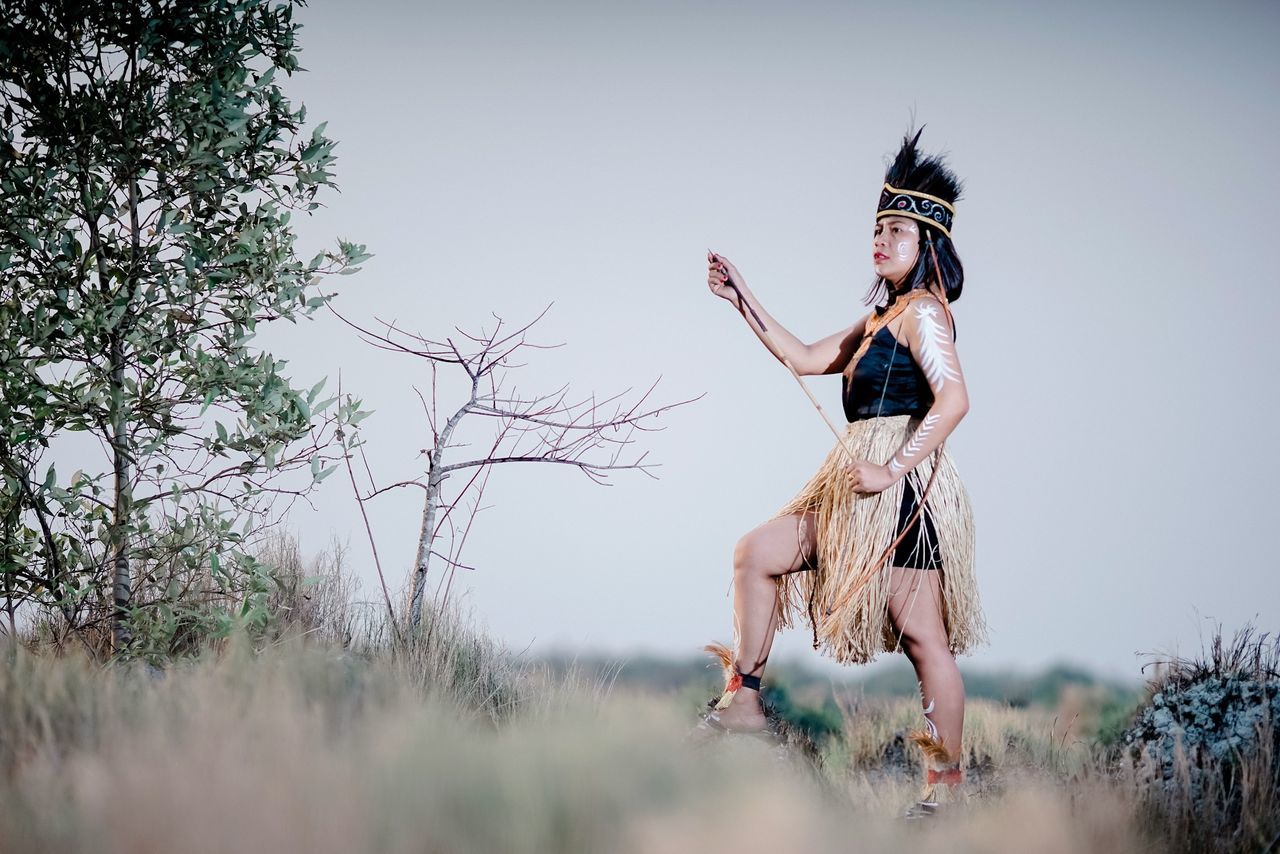 full length, adult, plant, nature, one person, women, tree, young adult, jumping, motion, clothing, spring, sky, day, emotion, vitality, outdoors, land, happiness, lifestyles, activity, copy space, person, leisure activity, female, landscape, carefree, rural scene